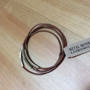 Brown and gold inspirational bangles