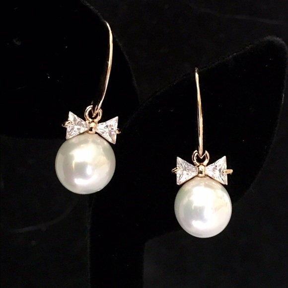 Pearl drop earrings with rhinestone bows!