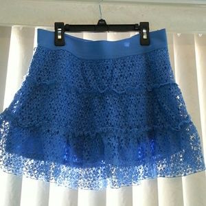 Justice skort with lacy overlay.