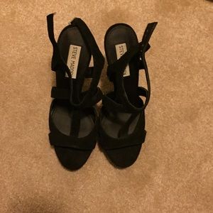 Black strappy Steve Madden heels.