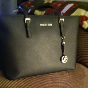 Michael kors purse.