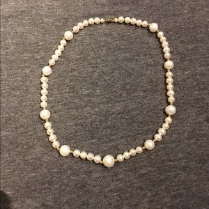 Genuine pearl necklace with gold beads