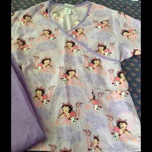 A set preowned scrub top and pants.