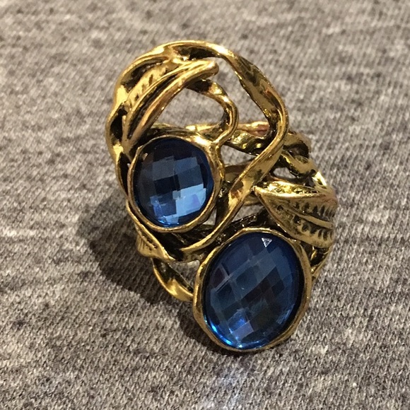 Gold tone blue stone statement ring