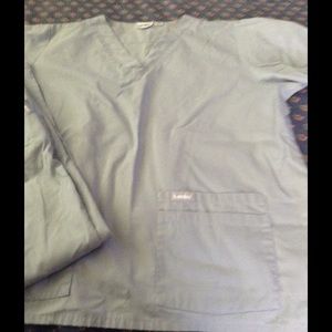 4 sets of solid color preowned scrub top and pants
