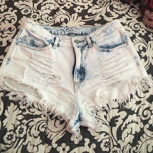 High waisted, acid washed distressed Jean shorts