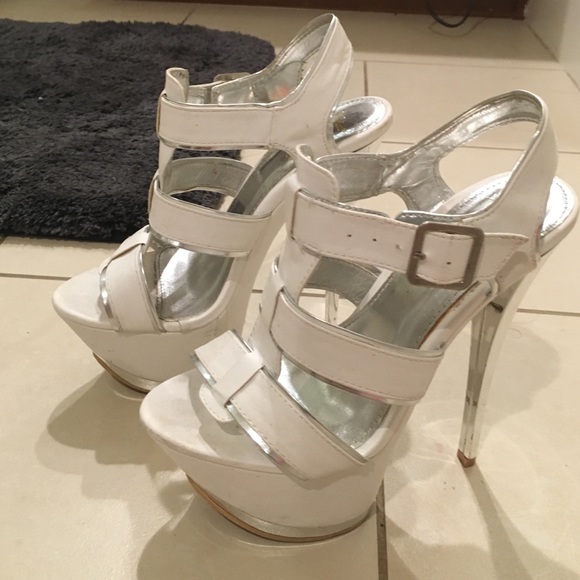 Bright white silver stripping stillettos