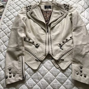CREAM STUDDED JACKET W/MULTIPLE ZIPPER DETAIL