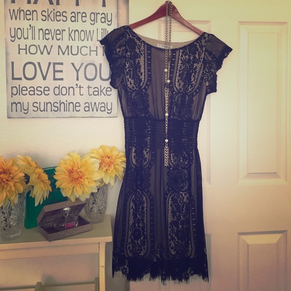 Dress: black lace, perfect condition never worn.