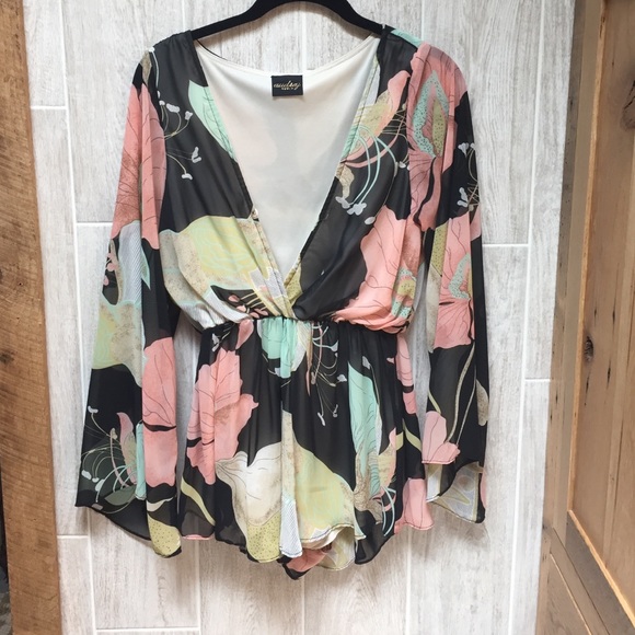 Cute spring romper with sheer bell sleeves