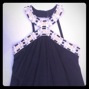 Flattering silk beaded dress. From Neiman Marcus.