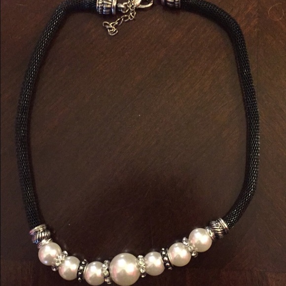 Black and pearl necklace.