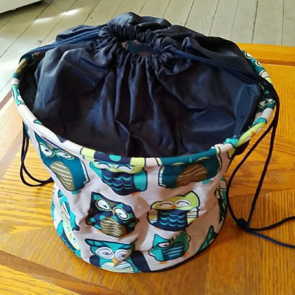 Thirty one round storage with drawstring top
