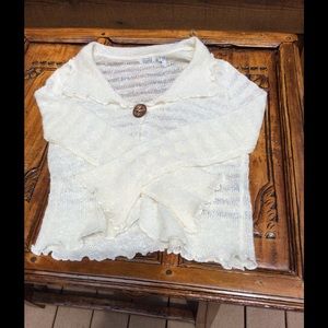 Cream colored little dress sweater.
