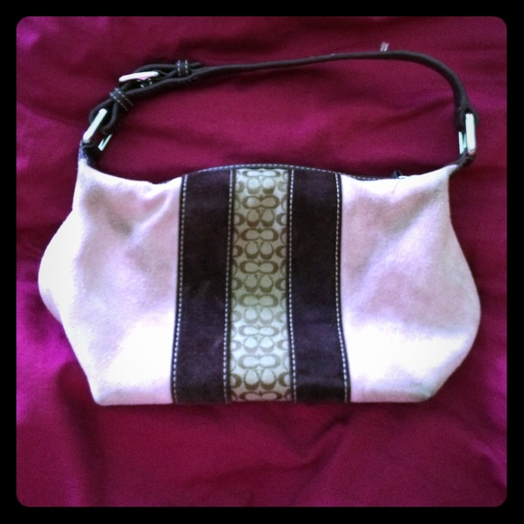 a small coach hand bag