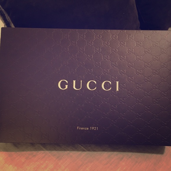 Gucci box, tissue, and string