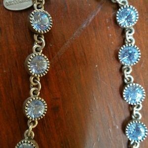 Choker with light blue crystals