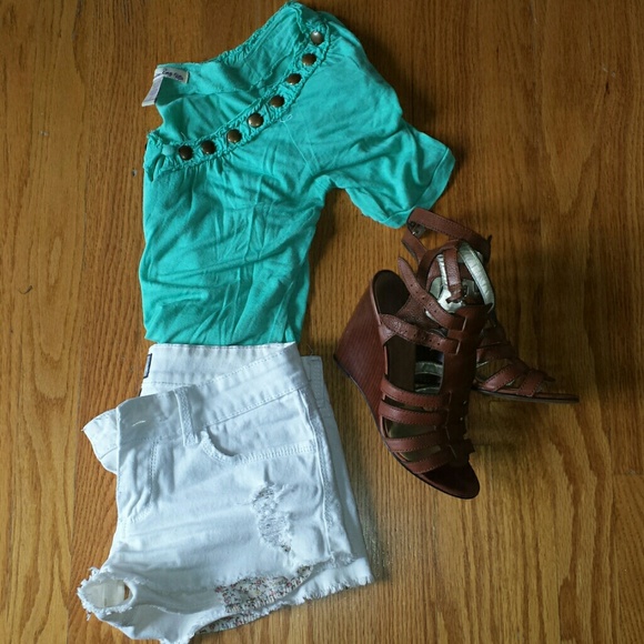 Turquoise top with bronze medallion