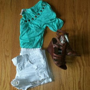 Turquoise top with bronze medallion