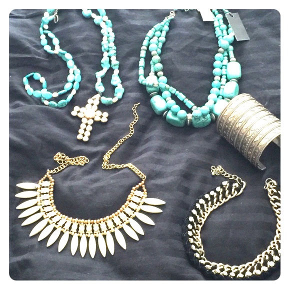 4 necklaces and bracelet