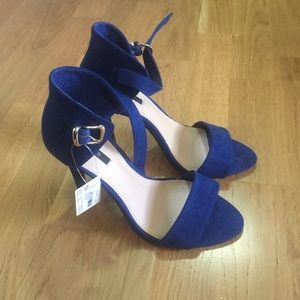 Never been worn Forever 21 blue heels!