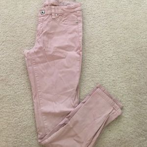 Blush skinny jeans