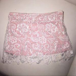 Baby pink and white lace zip up skirt .