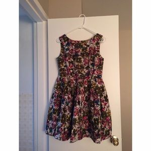 Bar III floral dress with cut-out back and bow.