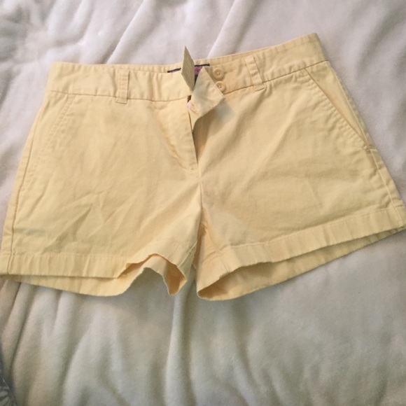 super cute yellow shorts! slight mark on back.