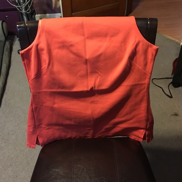 Bright orange shell top.