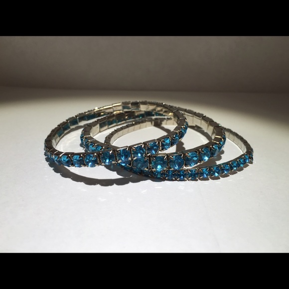3 blue bracelets