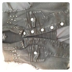 Black studded vest
