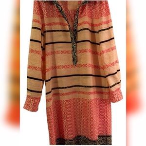 Knee length shirt dress.