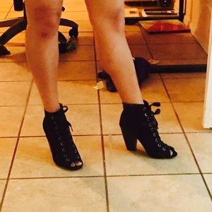 Black suede laced up heeled booties