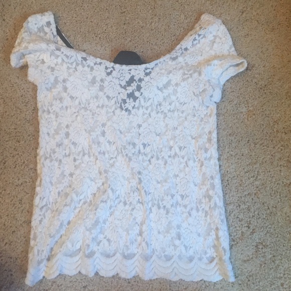 White lace too, black bow in the back that ties