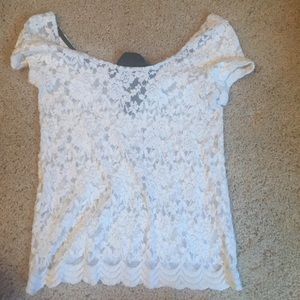 White lace too, black bow in the back that ties