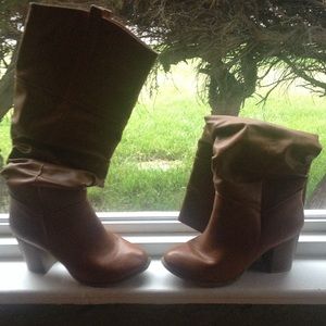 Brown heeled boots.
