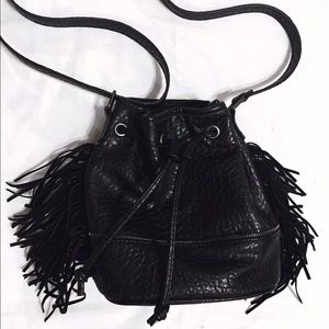 Fringe cross body bucket bag faux leather