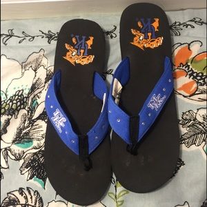 UK Wildcat flip flops