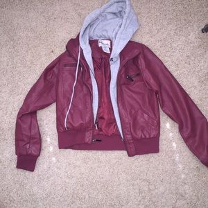 dark red/maroon leather jacket with under layer