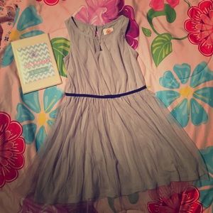 Gray dress with a black ribbon