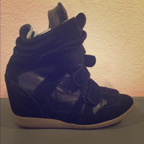 Steve Madden black suede wedge sneaker.