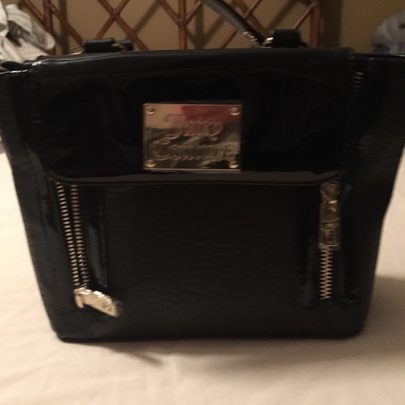 Juicy Couture crossover or small handbag.