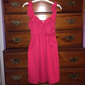 Frilly dress with a fitted waist band
