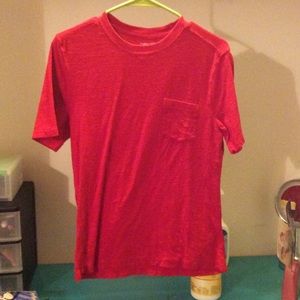 Red Tshirt with pocket.