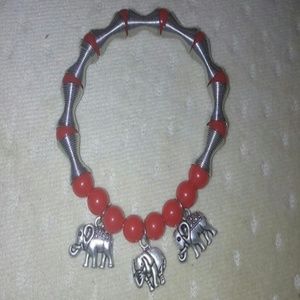 Red beads and silver elephant bracelet