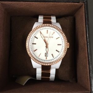Gold and white Michael kors watch
