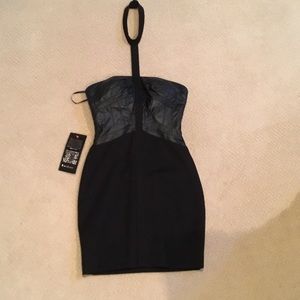 Never worn, tags still on BeBe choker dress.