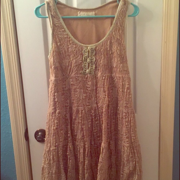 Cream boutique dress. size medium