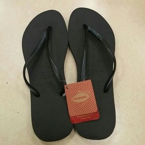 Black Havaianas flip flops (new with tags)